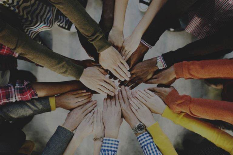 Group of hands showing ethnic diversity
