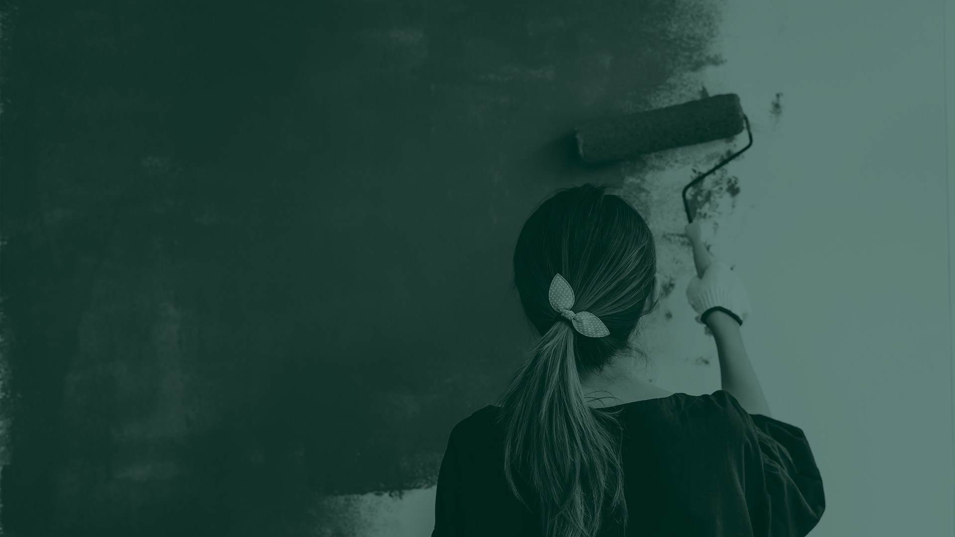 green overlay of woman painting wall with roller