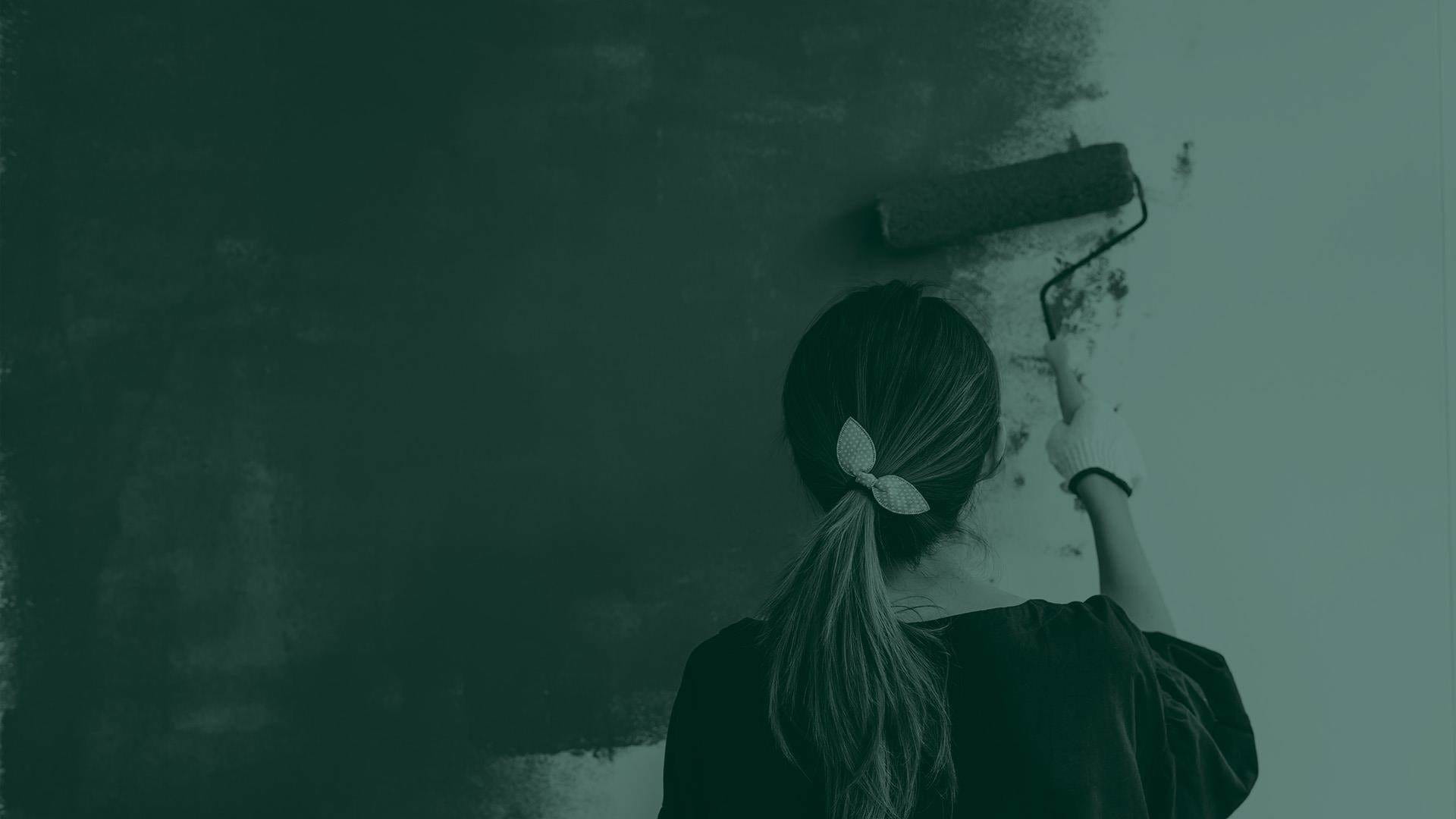 green overlay of woman painting wall with roller