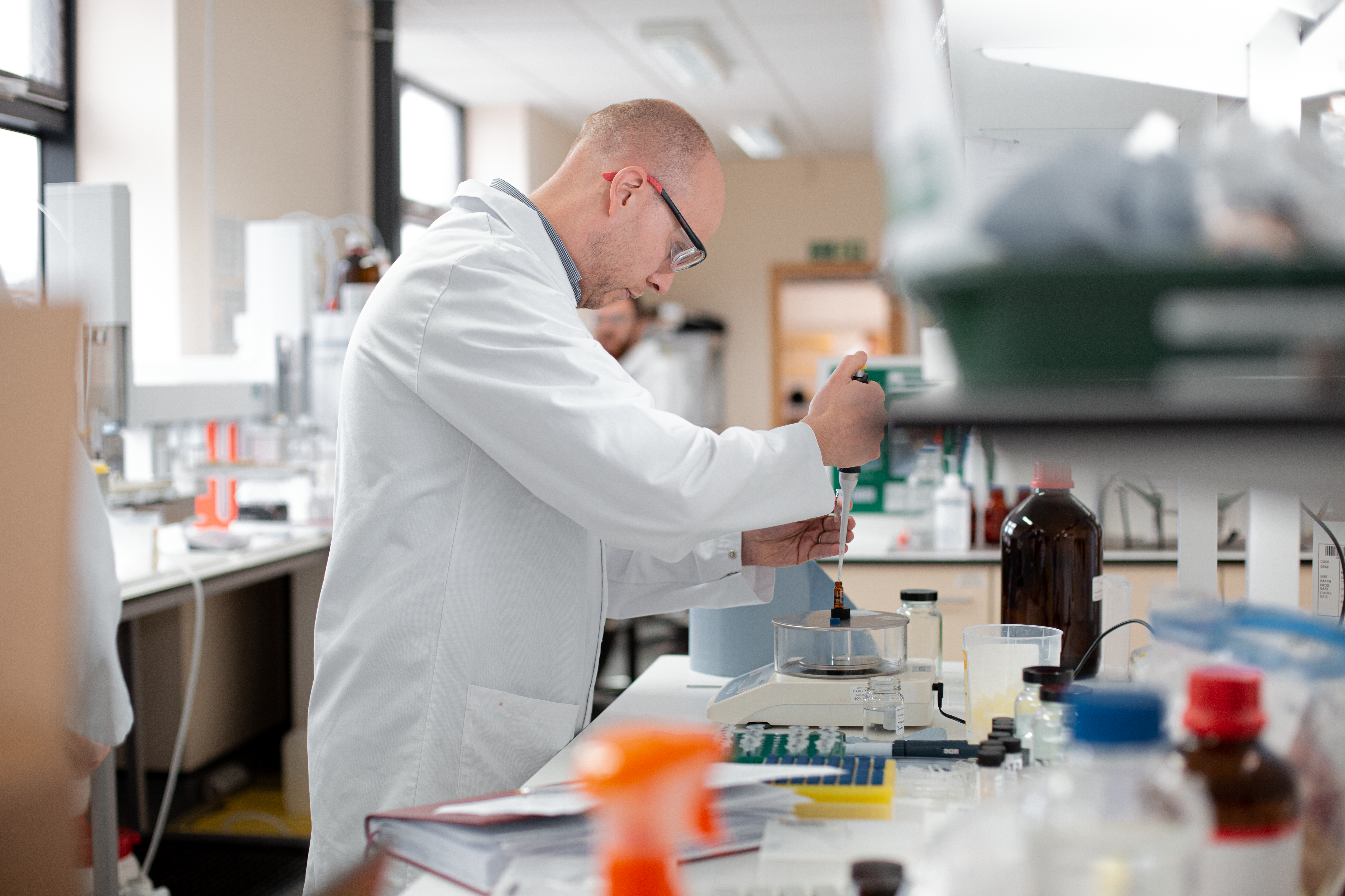 Chemist performing experiment in a laboratory