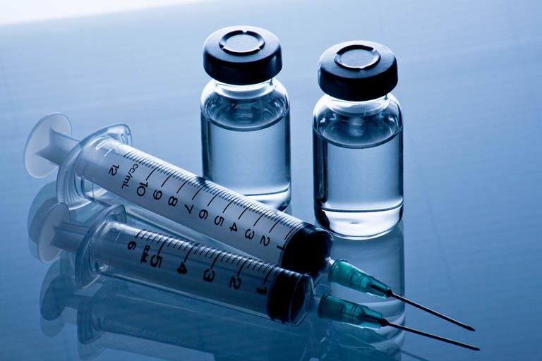 syringe and vaccine
