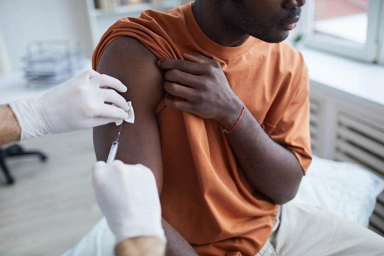 Person in hospital being given vaccine