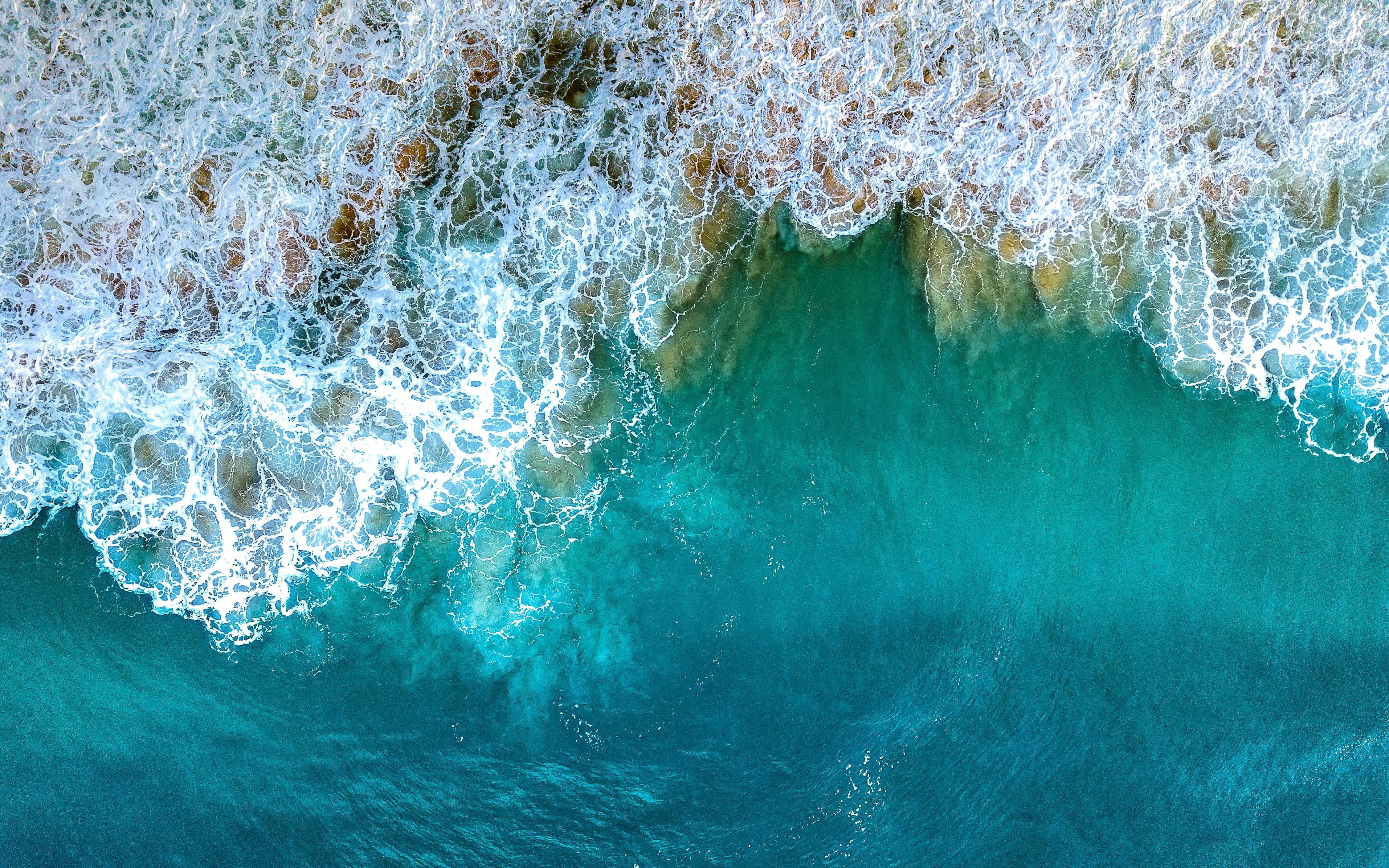 ariel shot of a breaking wave showing texture