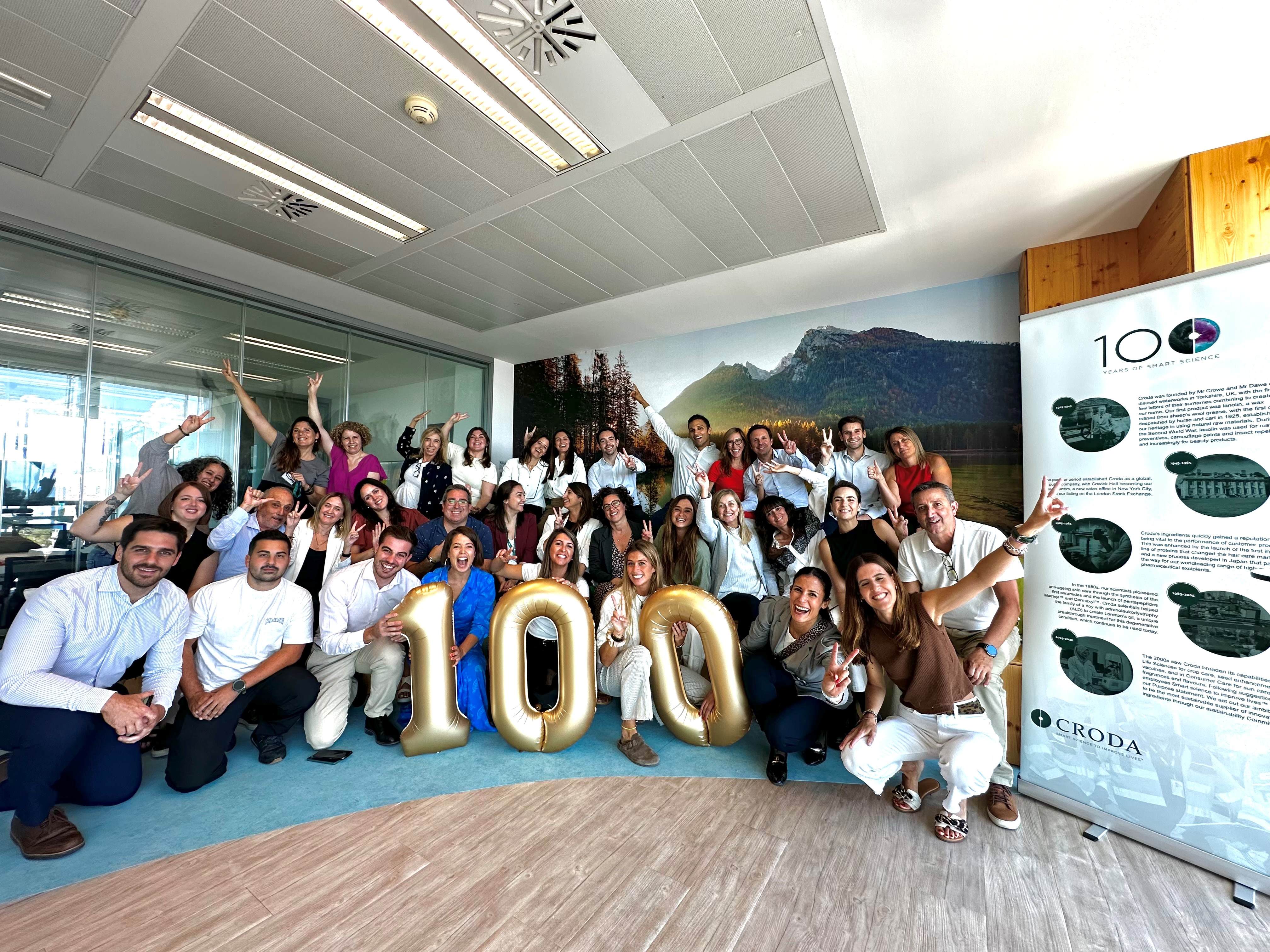 employees celebrating together in office location