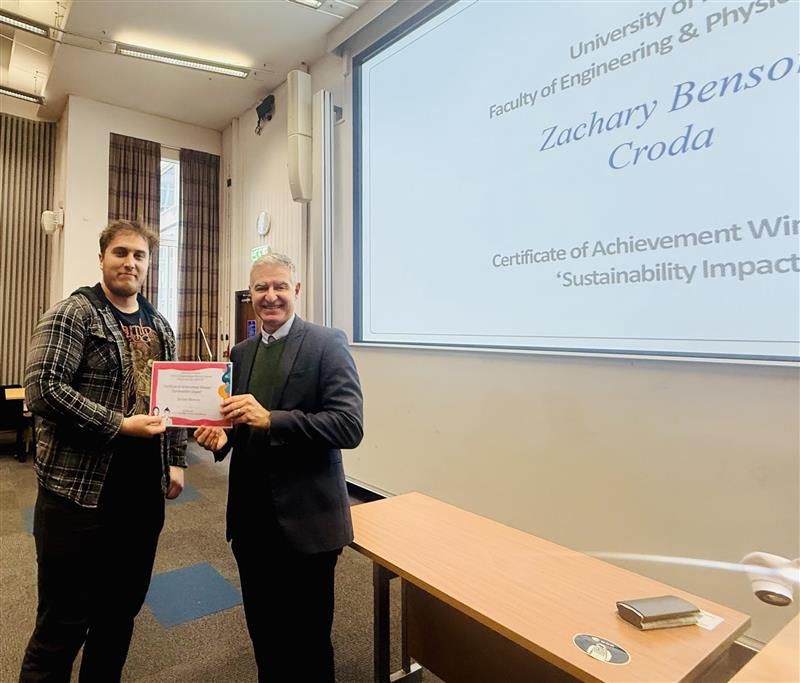 Employee winning award for sustainability