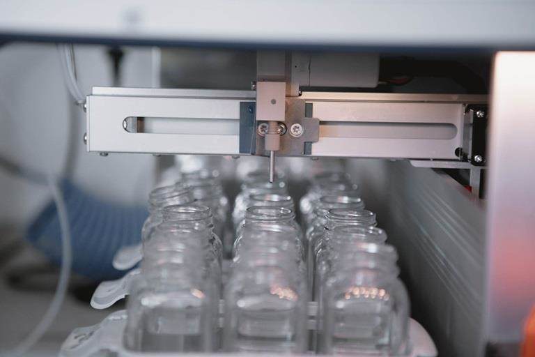 Miniature bottles filled as part of QA