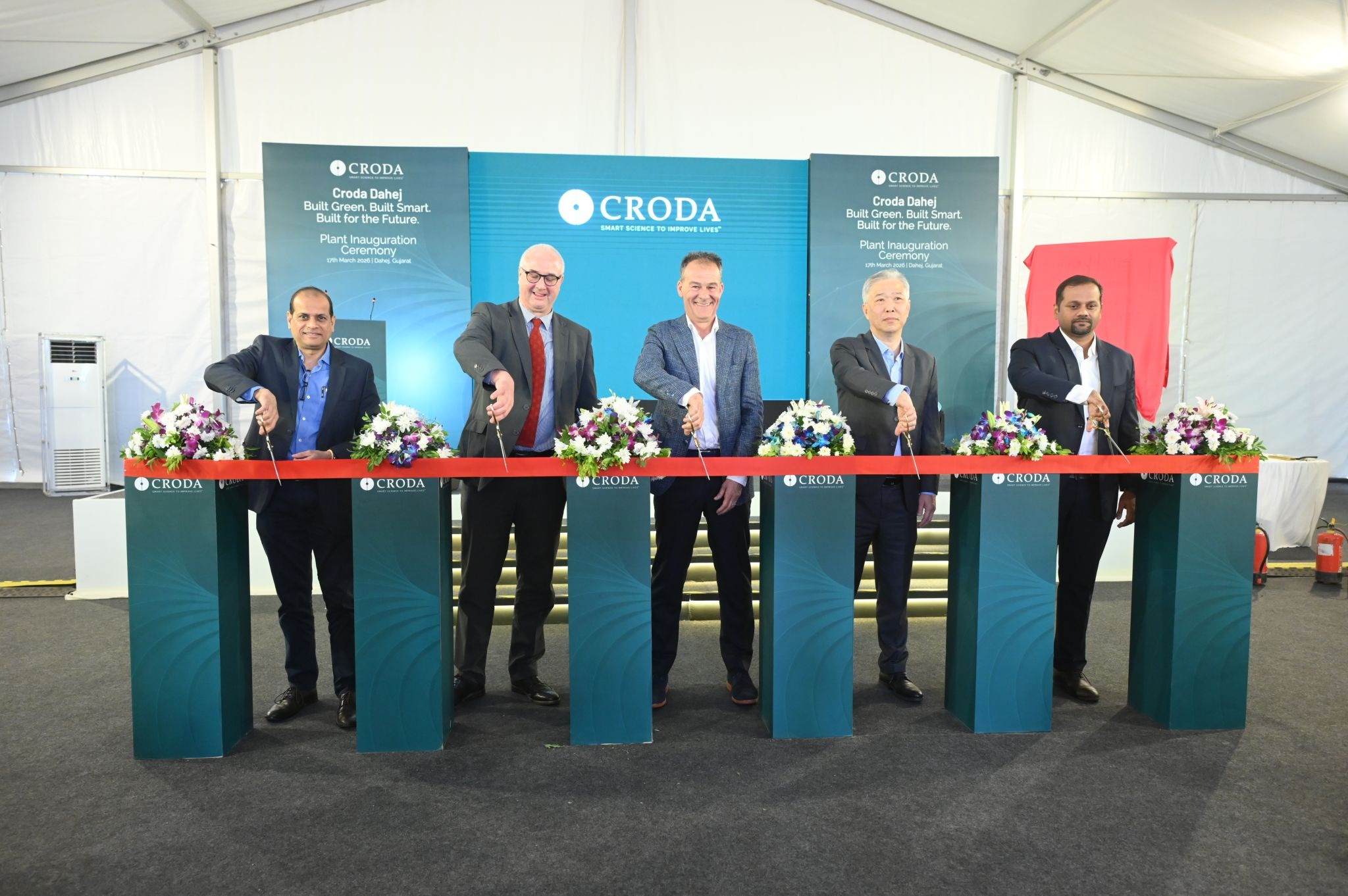 Croda senior leaders cutting ribbon at new Dahej facility in India